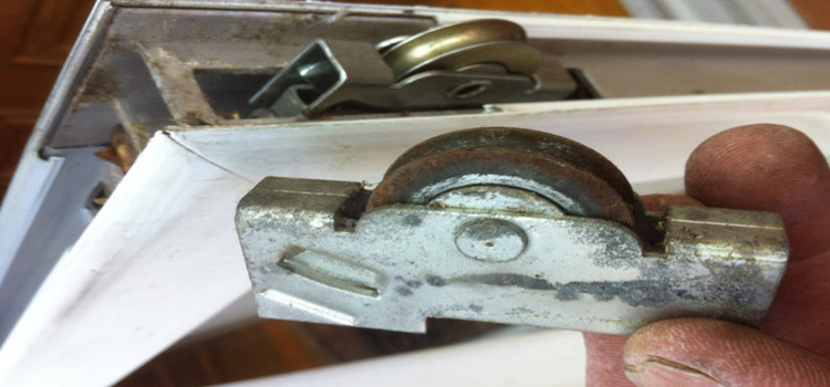 screen door roller repair in Northeast Edmonton
